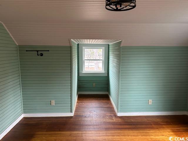 2708 Main St, Loris, SC 29569 - empty room with baseboards and dark wood-type flooring