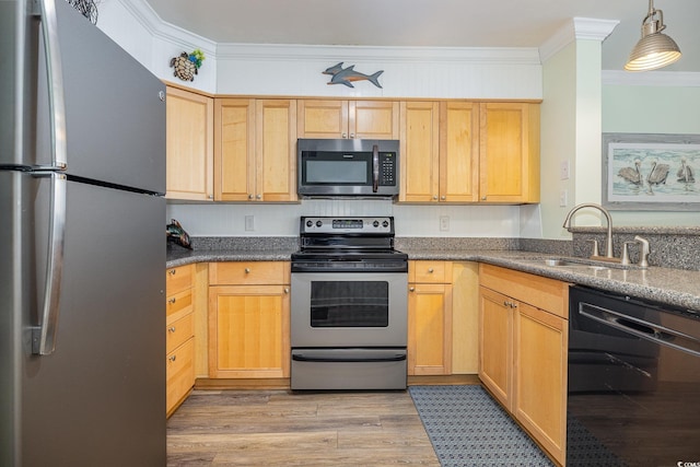 kitchen with sink, hanging light fixtures, appliances with stainless steel finishes, ornamental molding, and light brown cabinetry