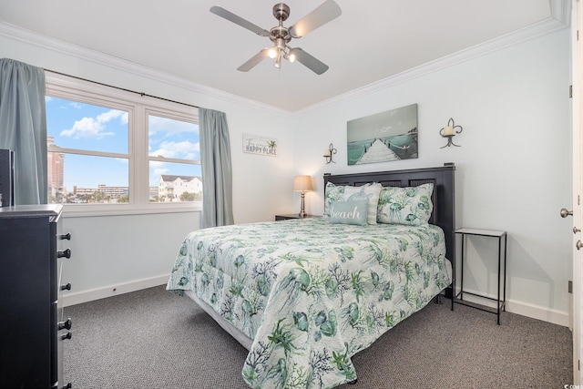 bedroom with ceiling fan, ornamental molding, and dark colored carpet