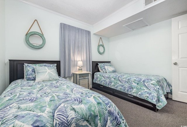 bedroom with carpet floors, crown molding, and a textured ceiling