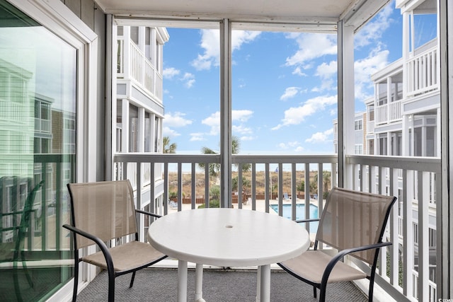 sunroom / solarium featuring a wealth of natural light