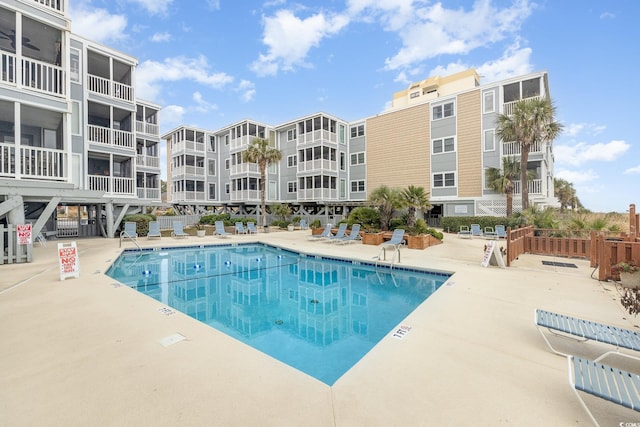 view of swimming pool with a patio area