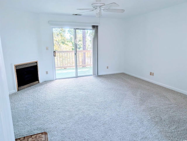 100G Myrtle Greens Dr Unit G, Conway, SC 29526 - unfurnished living room featuring a ceiling fan, carpet flooring, heating unit, and a fireplace