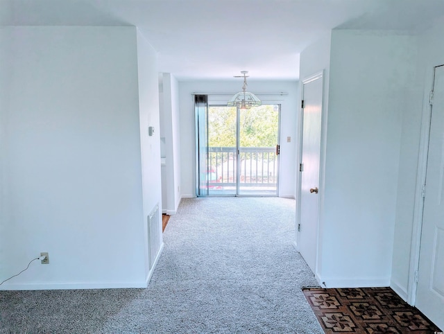 100G Myrtle Greens Dr Unit G, Conway, SC 29526 - hallway with a chandelier and carpet