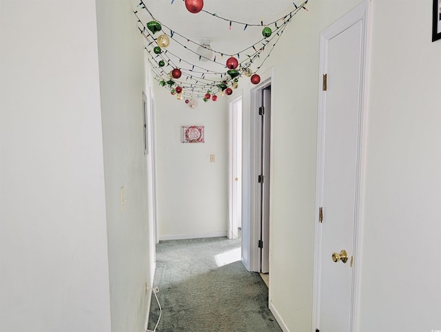 corridor featuring carpet flooring