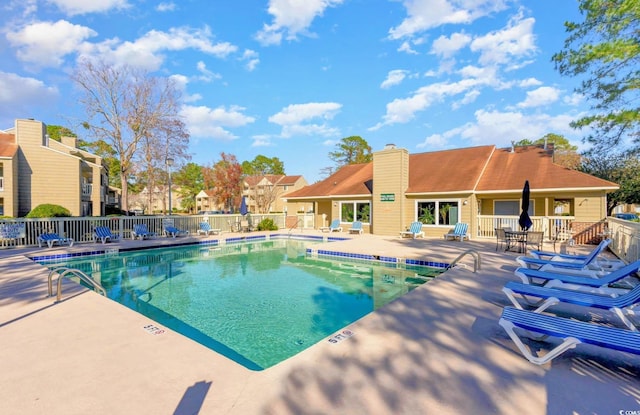 view of swimming pool featuring a patio