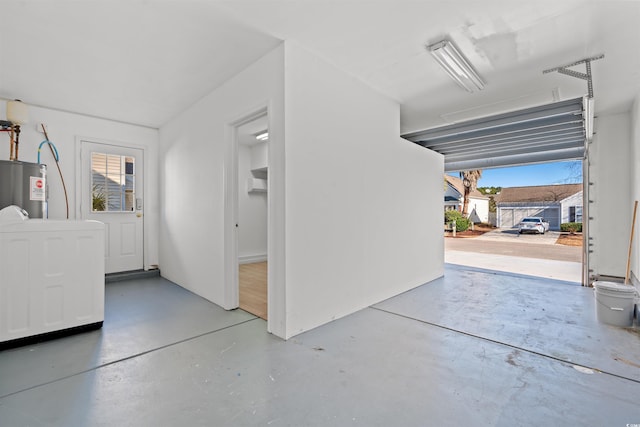 garage featuring water heater