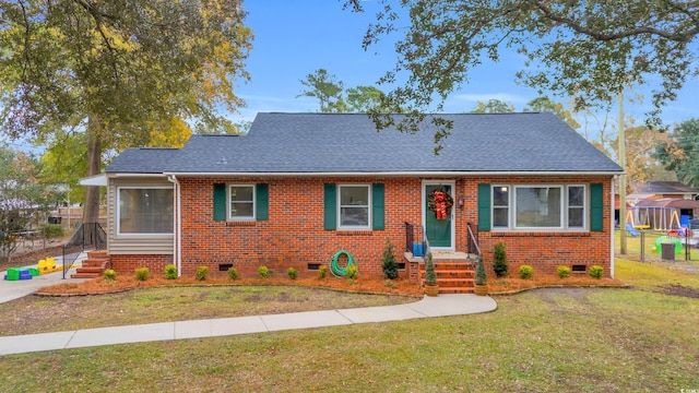 view of front of home with a front lawn