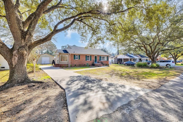 ranch-style home featuring brick siding, crawl space, a garage, a residential view, and driveway