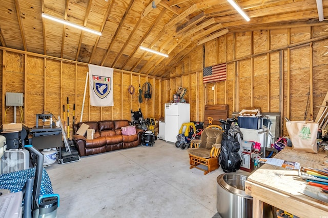 garage with freestanding refrigerator