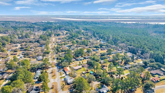 bird's eye view with a water view and a residential view