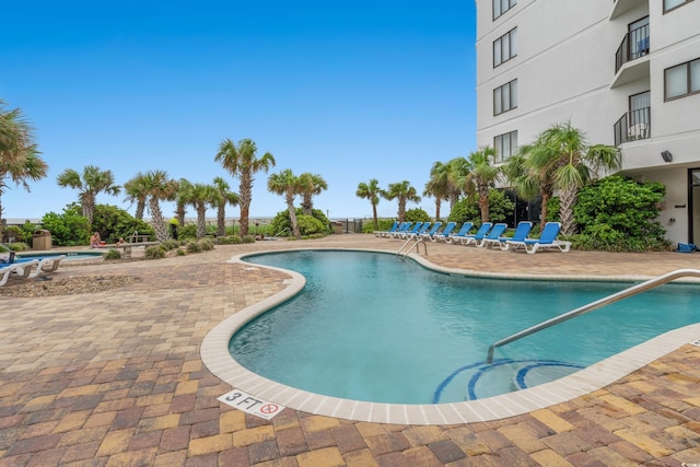 view of pool with a patio