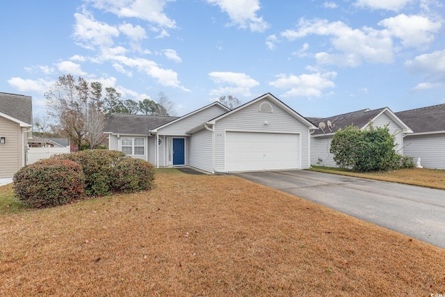 single story home with a front yard and a garage