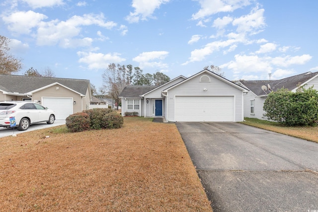 ranch-style home featuring a garage