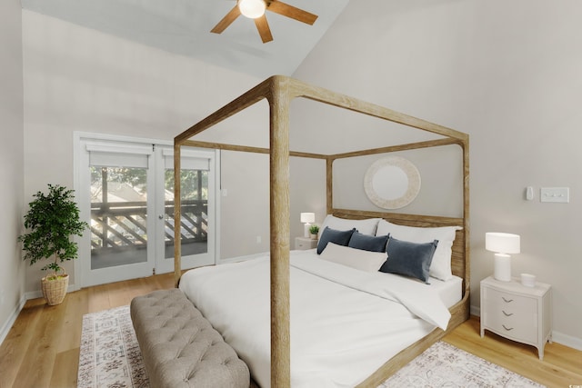 bedroom with access to outside, ceiling fan, lofted ceiling, and hardwood / wood-style flooring