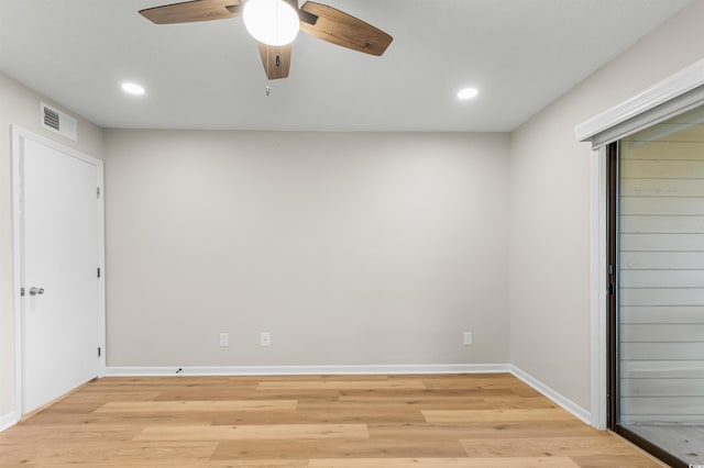 unfurnished room featuring ceiling fan and light hardwood / wood-style floors