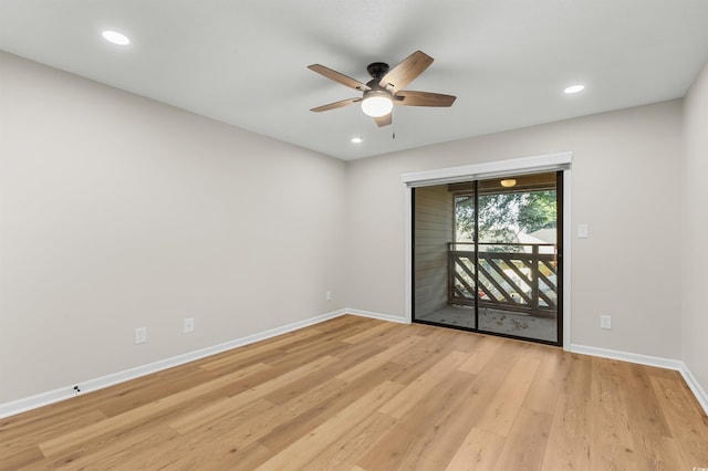 empty room with light hardwood / wood-style flooring and ceiling fan