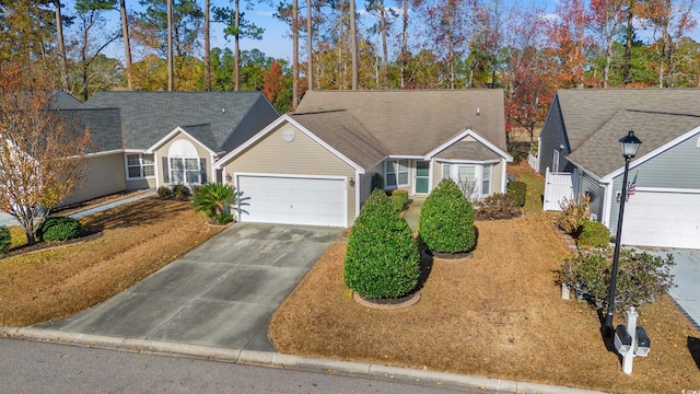 single story home featuring a garage