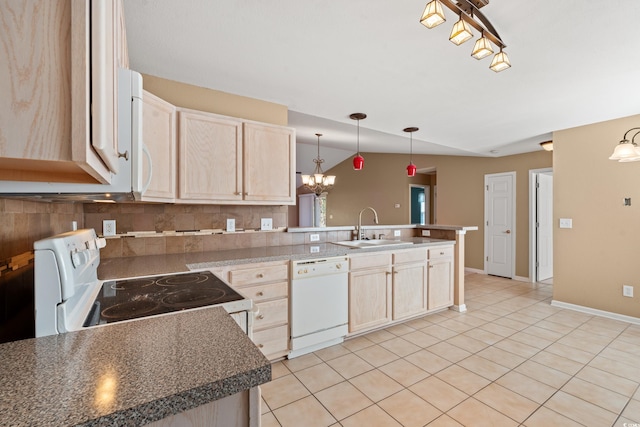 kitchen featuring decorative backsplash, white appliances, sink, light brown cabinets, and pendant lighting