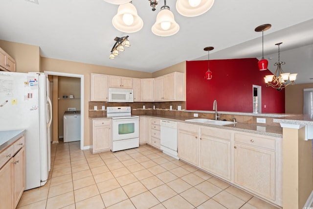 kitchen featuring sink, a notable chandelier, kitchen peninsula, decorative light fixtures, and white appliances