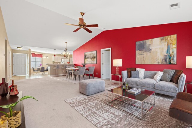 352 Mckendree Ln, Myrtle Beach, SC 29579 - carpeted living room with lofted ceiling, a ceiling fan, a chandelier, and baseboards