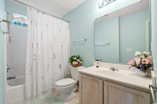 full bathroom featuring shower / bath combo, vanity, toilet, and tile patterned floors