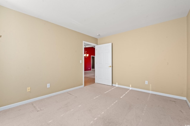 empty room featuring carpet floors