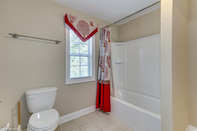 bathroom with tile patterned floors, toilet, and shower / tub combo