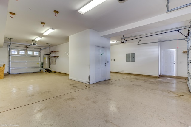 garage with electric panel, gas water heater, and a garage door opener