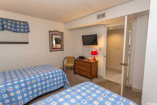 bedroom featuring a textured ceiling