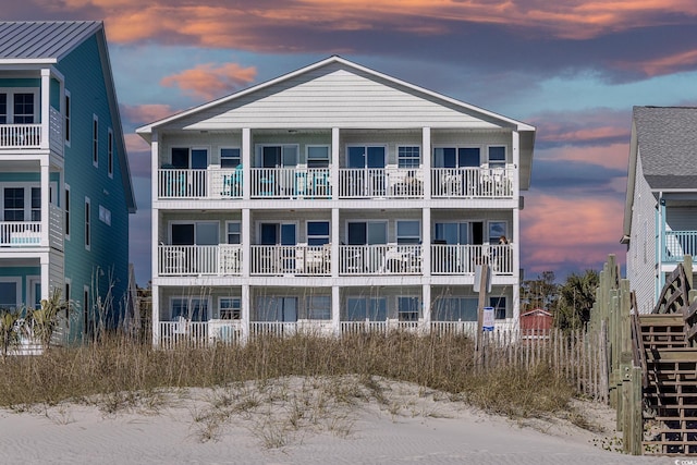 view of outdoor building at dusk