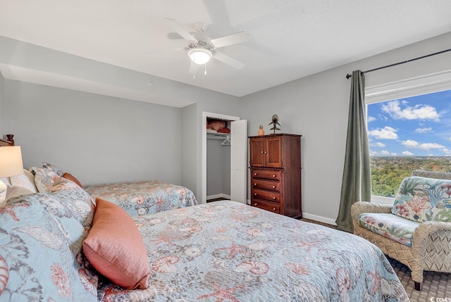 bedroom featuring a closet and ceiling fan