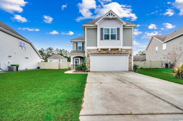 view of front of property with a garage, a front lawn, and cooling unit