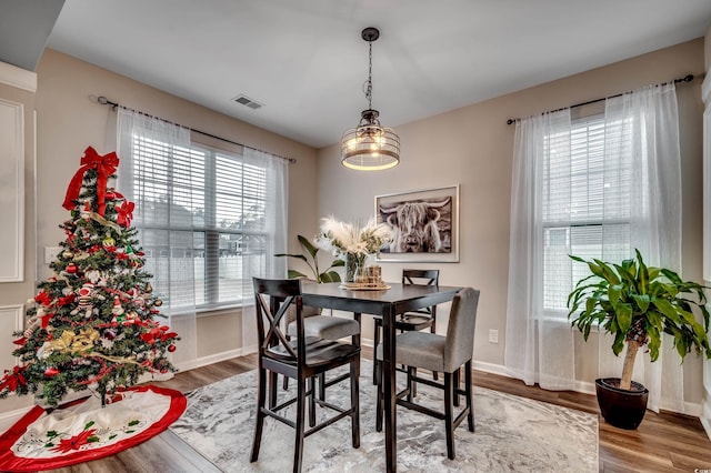 5433 Merrywind Ct, Myrtle Beach, SC 29579 - dining space featuring healthy amount of natural light and wood finished floors