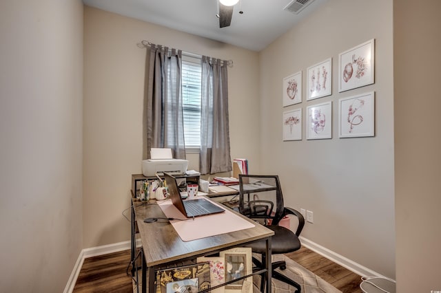 office area with ceiling fan and dark hardwood / wood-style flooring