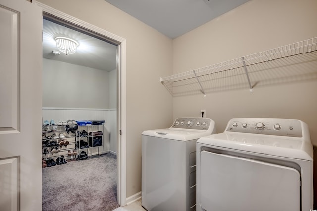 5433 Merrywind Ct, Myrtle Beach, SC 29579 - laundry room featuring washing machine and clothes dryer, carpet floors, and a wainscoted wall