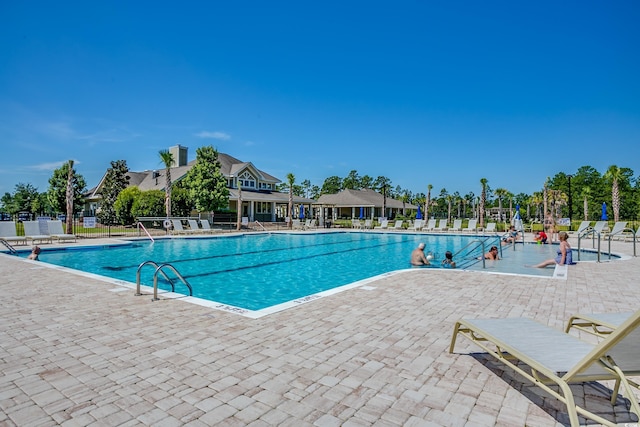 view of pool featuring a patio