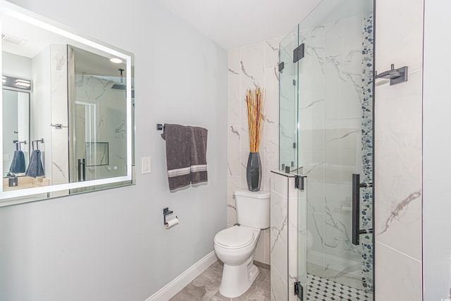 bathroom with an enclosed shower and toilet