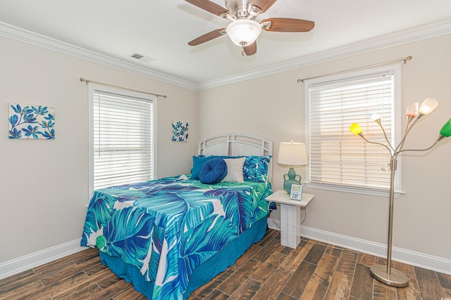 bedroom with multiple windows, ceiling fan, dark hardwood / wood-style flooring, and crown molding