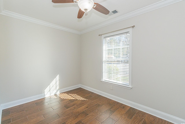 empty room with dark hardwood / wood-style floors, ceiling fan, and ornamental molding