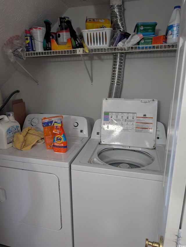 washroom with washer and clothes dryer