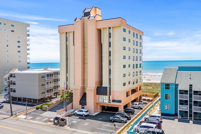 view of building exterior featuring a water view