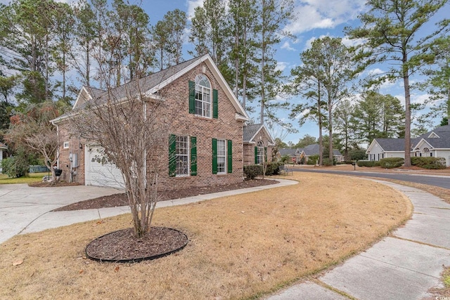 view of side of home featuring a garage