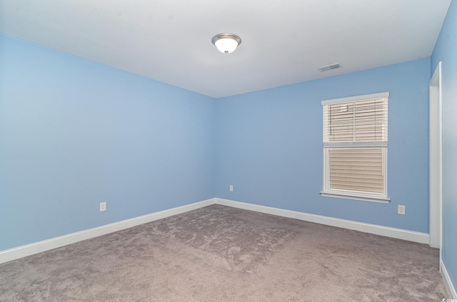 empty room featuring carpet flooring