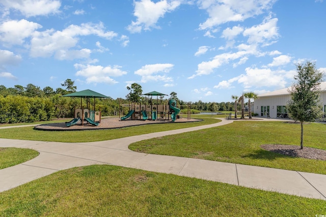 view of play area featuring a lawn