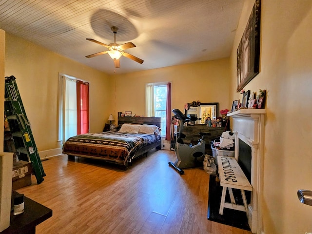 bedroom featuring ceiling fan and light wood-type flooring