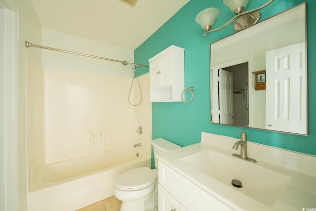 full bathroom featuring tile patterned floors, vanity, toilet, and shower / tub combination