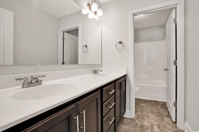 full bathroom with vanity, toilet, and tub / shower combination