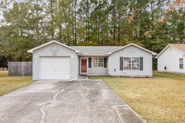 ranch-style home with a front yard and a garage