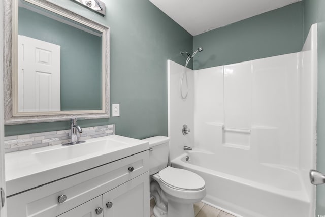 full bathroom featuring vanity, shower / bath combination, tasteful backsplash, and toilet